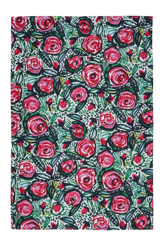 Vibrant Ulster Weavers cotton tea towel featuring bold red and pink roses on green leaves, eco-friendly and stylish for kitchens.