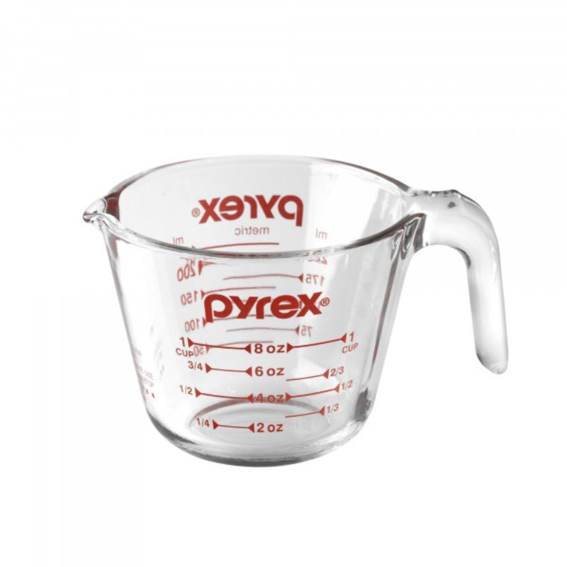 Clear Pyrex 1 Cup Measuring Jug (250ml) with easy-to-read measurements, ergonomic handle, and durable borosilicate glass.