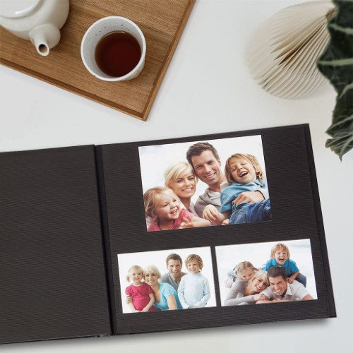 Self-adhesive black photo album with 5 pages for flexible mounting and protection of cherished memories.