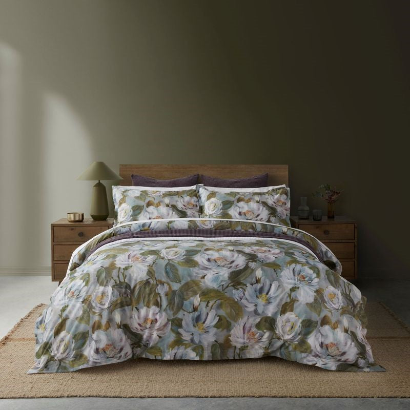FIGO Duvet Cover Set by BAKSANA features a watercolored floral print, crafted from OEKO-TEX® cotton for comfort and style.