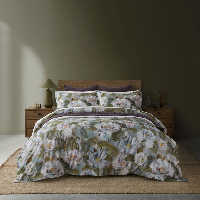 FIGO Duvet Cover Set by BAKSANA features a watercolored floral print, crafted from OEKO-TEX® cotton for comfort and style.