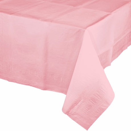 Classic pink plastic tablecover, 137cm x 274cm, perfect for parties, durable, easy to clean, and inviting decor accent.