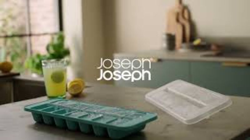 Joseph Joseph Flow Easy-fill Ice-cube Tray set for easy, spill-free ice cube filling with stackable design and lid.