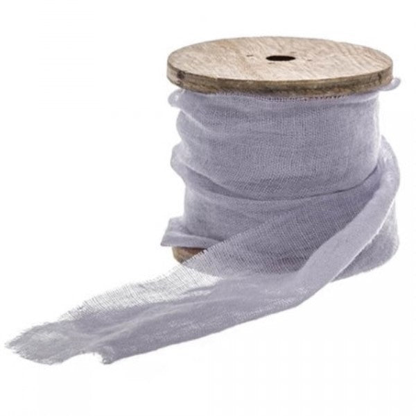 Luxurious hand-dyed blue faux silk ribbon with frayed edges, ideal for crafting and decorating projects.
