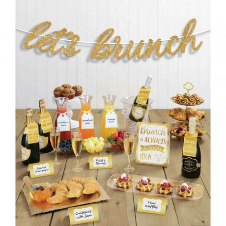 Mimosa Let's Brunch Decorating Kit featuring tent cards, glass tags, and a glittered banner for festive brunch celebrations.