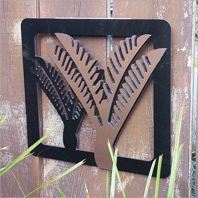 Two-tone Nikau art panels in brushed copper and black, perfect for adding Kiwiana charm to any indoor or outdoor space.