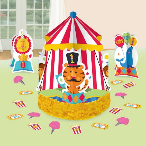 Colorful Fisher Price 1st Birthday Circus table decorations, featuring a fringe centerpiece and 3-D printed accents.