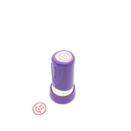 Pack of 6 red smiley face merit stamps for motivating students and decorating projects with clear impressions.