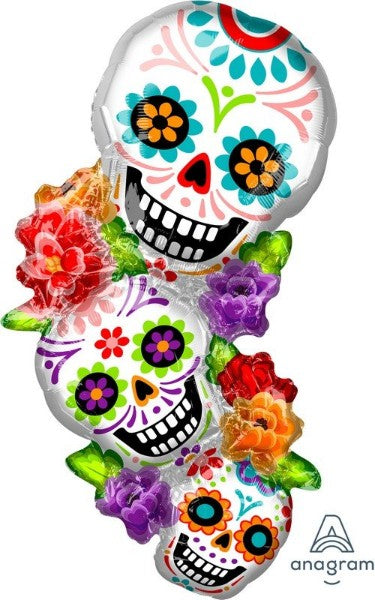 Vibrant supershape foil balloon featuring colorful sugar skulls, perfect for Day of the Dead and Halloween celebrations.