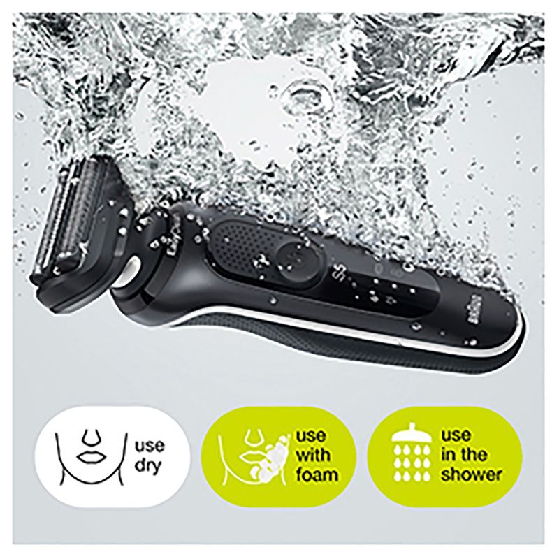 Braun Wet & Dry shaver with charging stand, 3 flexible blades, and 2 attachments for versatile grooming.