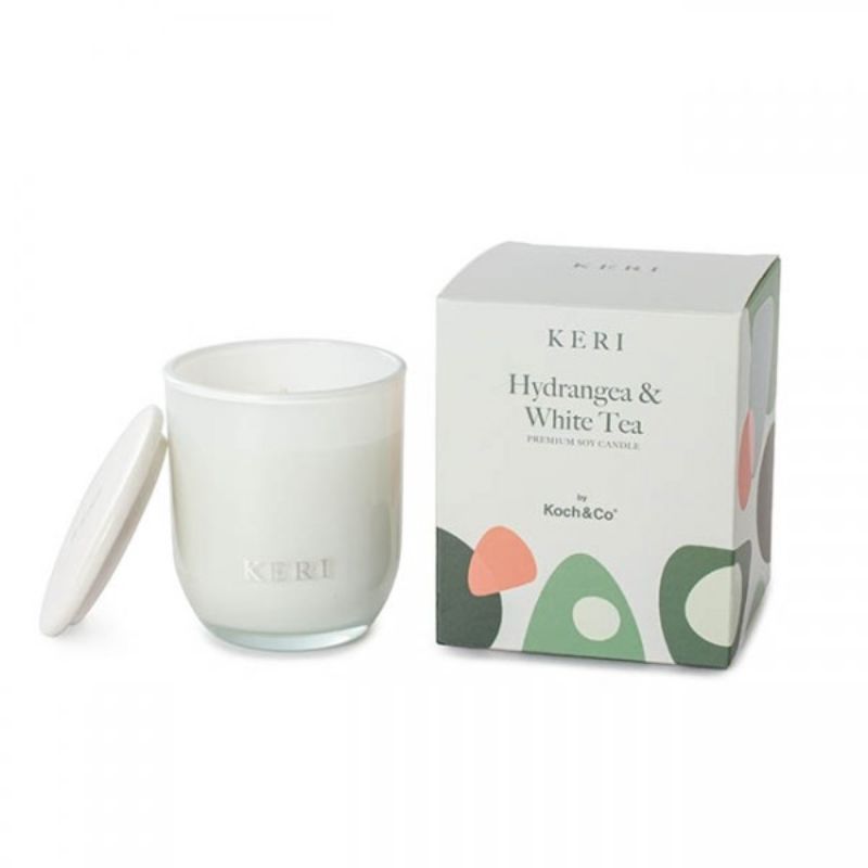 Luxury soy candle featuring hydrangea and white tea scents, burns for 30 hours, perfect for relaxation and home decor.
