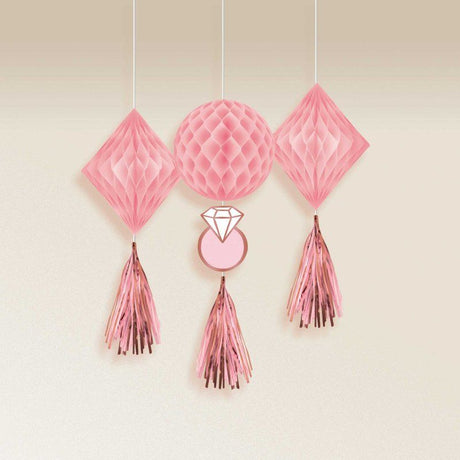 Pack of 3 blush honeycomb hanging decorations, featuring one large and two smaller sizes for elegant wedding decor.