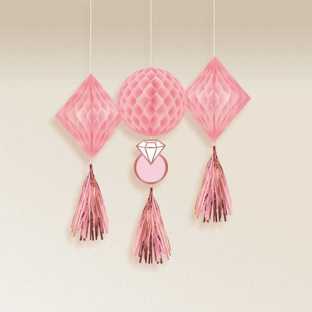 Pack of 3 blush honeycomb hanging decorations, featuring one large and two smaller sizes for elegant wedding decor.