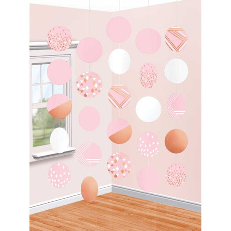 Elegant rose gold and blush hanging circle decorations, perfect for adding glamour to any celebration.