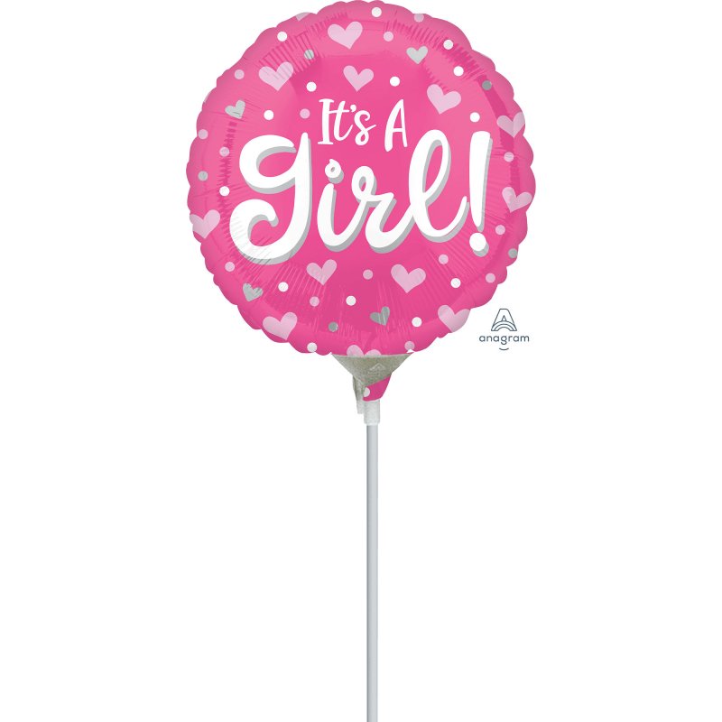 Heart and dot patterned foil balloon reading 'It's A Girl', perfect for celebrations like baby showers and gender reveals.