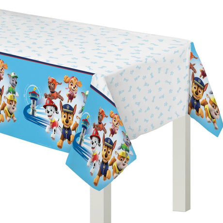 Colorful Paw Patrol Adventures paper table cover, measuring 137cm x 243cm, perfect for kids' parties.