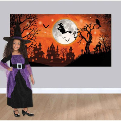 Halloween Scene Setter featuring classic orange and black witch motifs, perfect for indoor and outdoor spooky decor.