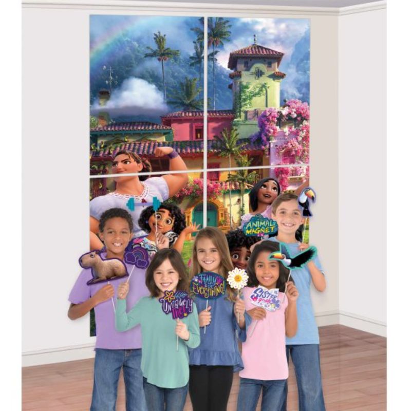 Colorful Encanto Scene Setter with 4 large backdrops and 12 fun photo props for vibrant themed parties.