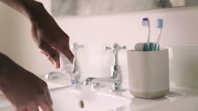 Joseph Joseph EasyStore Toothbrush Caddy in Ecru, designed for organized oral care with multiple sections and a chic matte finish.