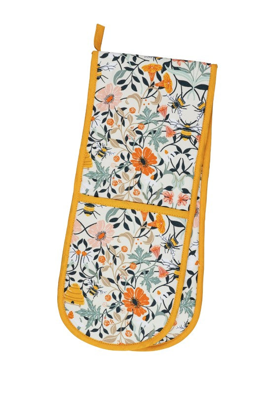 Ulster Weavers Double Oven Glove features vibrant bee patterns, eco-friendly materials, and ample protection for cooking.