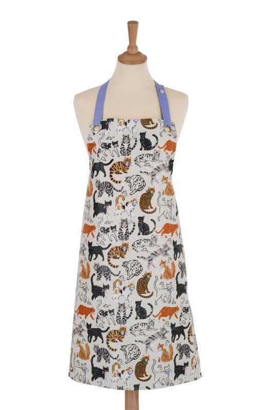 Colorful Ulster Weavers Oil Cloth Apron featuring whimsical cat illustrations and eco-friendly materials.
