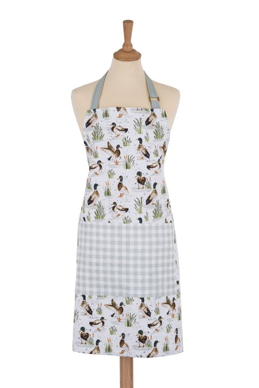 Whimsical cotton apron featuring hand-painted mallard ducks on a sage green base, eco-friendly and adjustable for comfort.