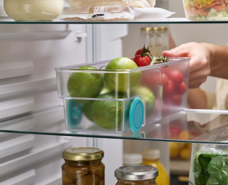 Joseph Joseph FridgeStore Small Storage, an efficient fridge organizer with easy-pull handle and removable divider.