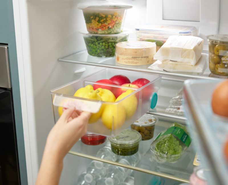 Joseph Joseph FridgeStore Large Storage drawer for efficient fridge organization with removable divider and easy-pull handle.