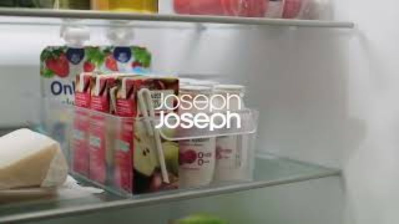Joseph Joseph FridgeStore Large Storage drawer with pull handle, wheels, and removable divider for organized fridge storage.