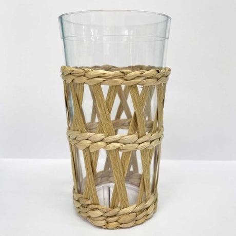 Clear plastic 480ml tumbler with a natural seagrass sleeve for insulation and grip, perfect for hot and cold beverages.