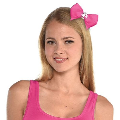 Pink Barbie bow hair clip, measuring 15cm x 11cm, perfect for adding fun and style to any hairstyle.