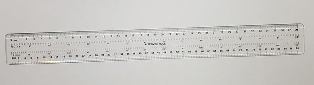SERVICE RULE 38CM design ruler for precise measurements in architecture and art, featuring durable build and sleek style.