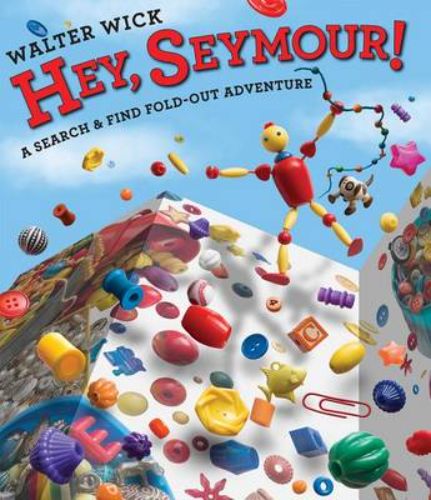 Oversized hardback 'Hey, Seymour!' featuring Walter Wick's search-and-find adventures with Seymour and Buttons.