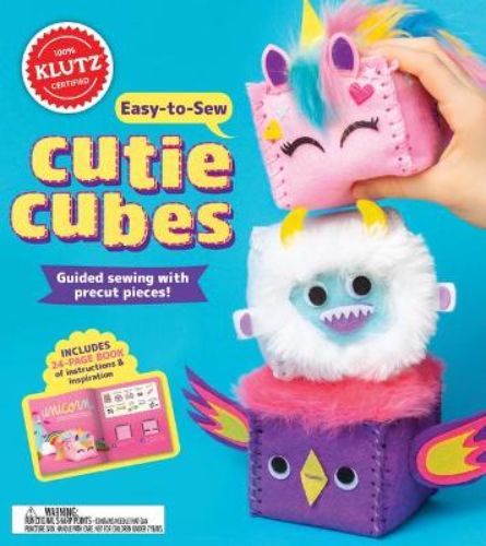 Engaging sewing kit for kids with pre-cut felt pieces to create magical-themed cubes: yeti, unicorn, and dragon.