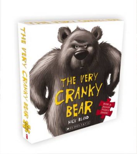 A colorful jigsaw set featuring The Very Cranky Bear storybook and a 60-piece puzzle for children aged 3 and up.