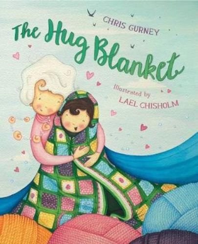 A beautifully illustrated hardback book, 'The Hug Blanket', exploring themes of family, love, and nostalgia in Te Reo.