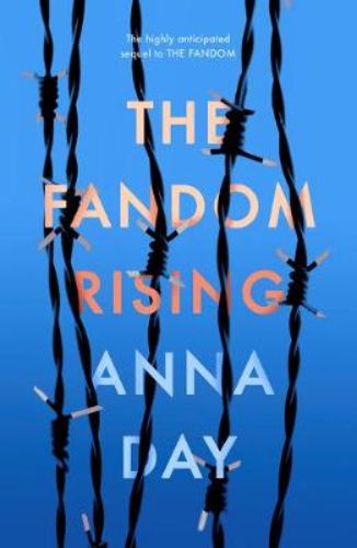 Paperback copy of 'The Fandom Rising,' a thrilling sequel featuring Violet, Katie, and a rogue fanfiction writer.