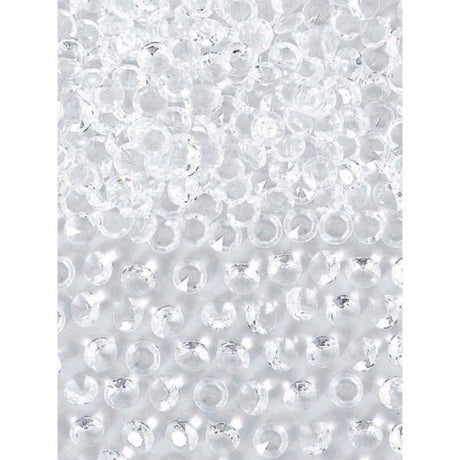 Clear confetti gems with pointed bases, ideal for adding sparkle to celebrations and events; 1oz pack, lightweight and versatile.