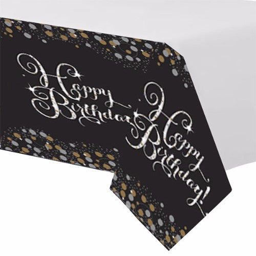 Elegant sparkling black tablecover for birthdays, measuring 137cm x 259cm, enhances party décor while protecting tables.