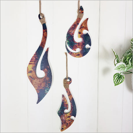 Set of 3 Kiwiana printed wall hooks in vibrant colors, made from durable ACM, ideal for lightweight items and decor.