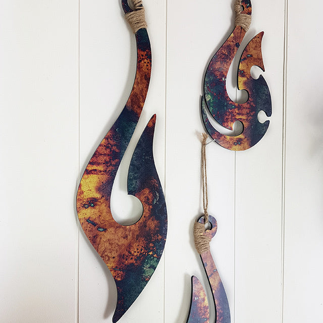 Set of 3 Kiwiana printed wall hooks in vibrant colors, suitable for lightweight items and outdoor use, elegantly gift boxed.