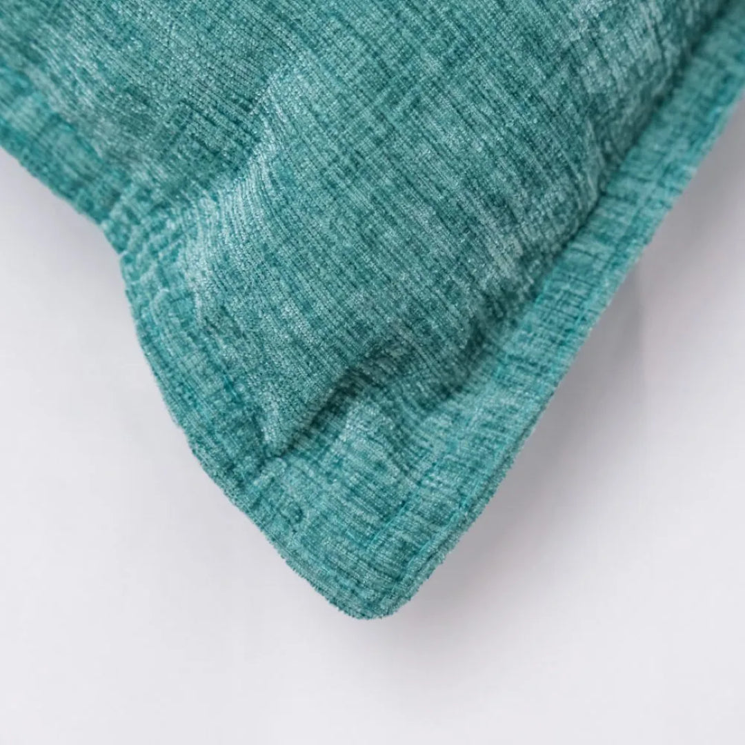 Luxurious oblong cushion cover in premium chenille, double-sided with zip enclosure for easy care and stylish comfort.