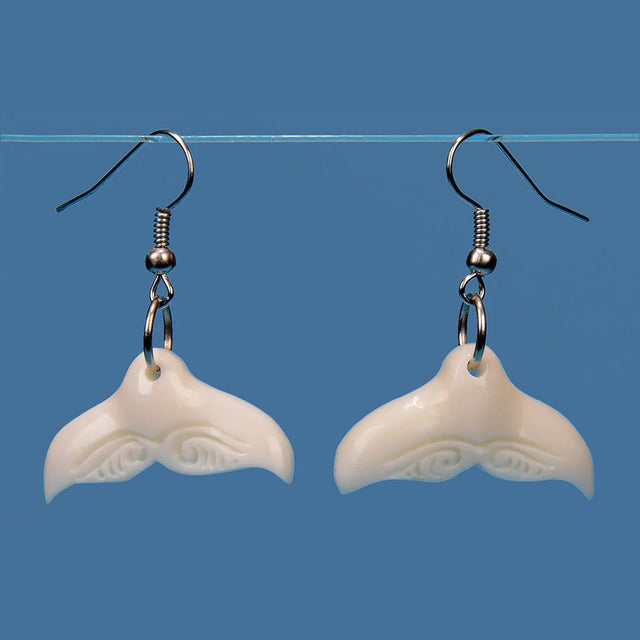 Handcrafted Bone Whale Tail Earrings showcasing Kiwiana artistry, embodying New Zealand's culture and marine life.