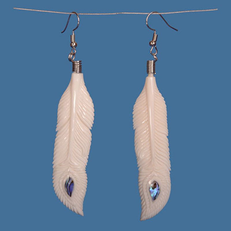 Handcrafted Bone Feather earrings with iridescent Paua inlays, showcasing Maori artistry and unique patterns.