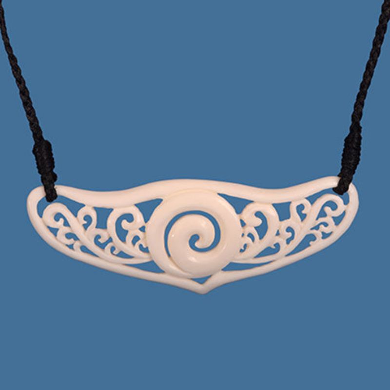 Intricate Koru breastplate necklace, handcrafted from beef bone, symbolizing renewal and nature's beauty, adjustable cord for comfort.