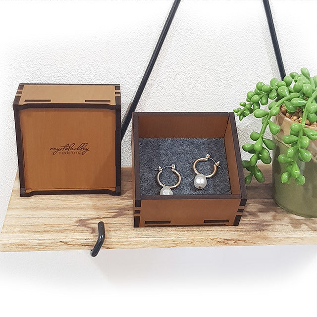 Elegant small square trinket box made of NZ Rimu and Pine veneer, perfect for organizing jewelry and keepsakes.