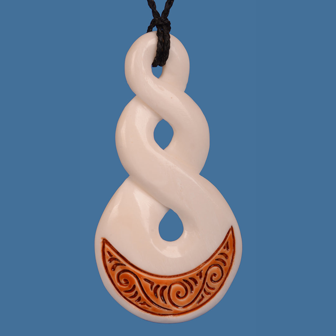 Maori Bone Double Twist Pendant, 43mm x 83mm, symbolizing life's journey, on a black braided cord.