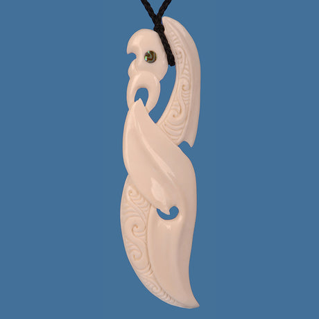 Extra Large Bone Manaia Pendant featuring intricate Maori carvings for protection and spiritual guardianship.