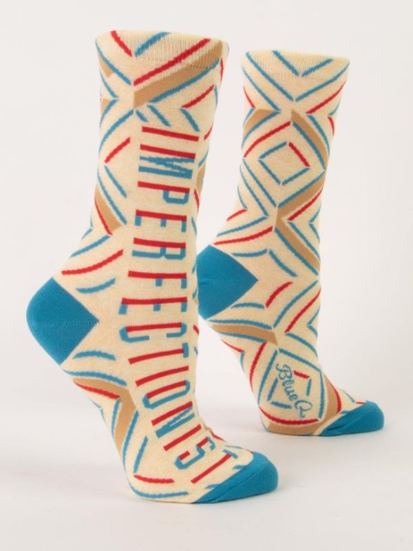 Whimsical Blue Q women's crew socks featuring a bold 'Imperfectionist' design for comfort and self-expression.