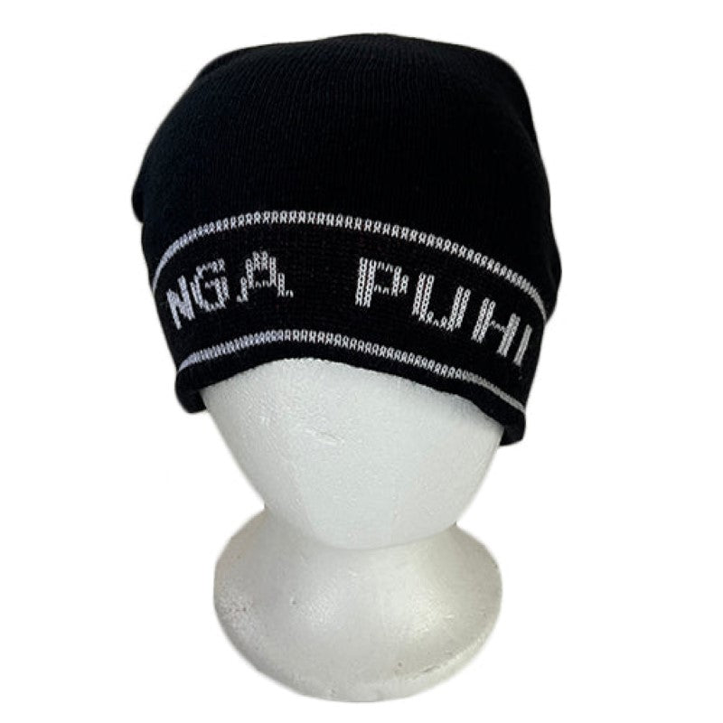 Handcrafted Maori Ng?puhi beanie in black and white, blending style and tradition for warmth in all seasons.